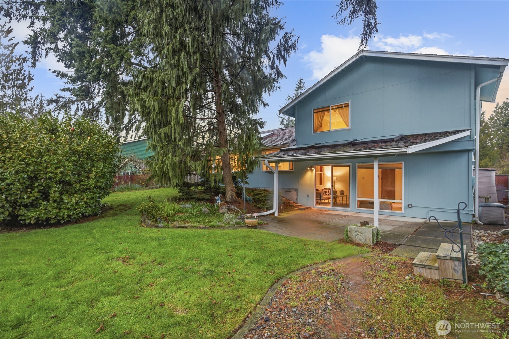 14523 Southeast 167th Street Renton, WA 98058 - Photo 8 of 39 a view of a house with a yard porch and sitting area