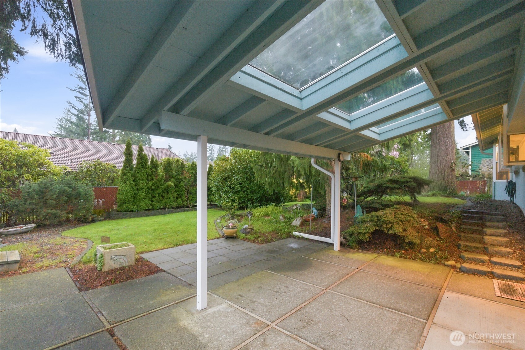 14523 Southeast 167th Street Renton, WA 98058 - Photo 9 of 39 a view of a porch with furniture and garden