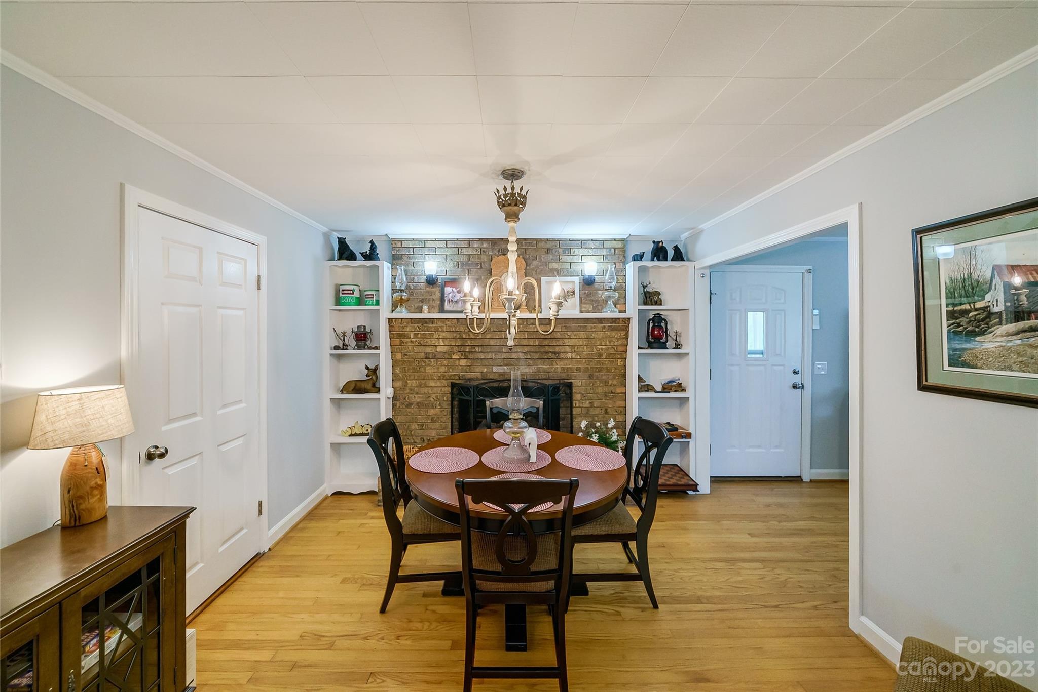 292 Welch Road Lansing, NC 28643 - Photo 9 of 47 a view of a dining room with furniture and wooden floor