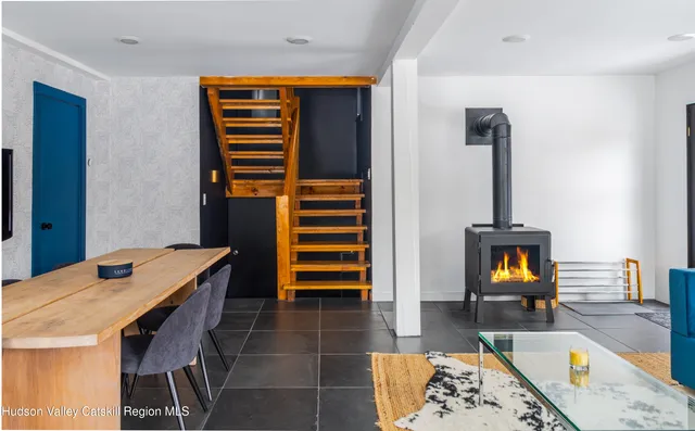 a kitchen with a sink cabinets and window