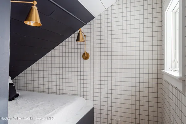 a view of a balcony with wooden floor
