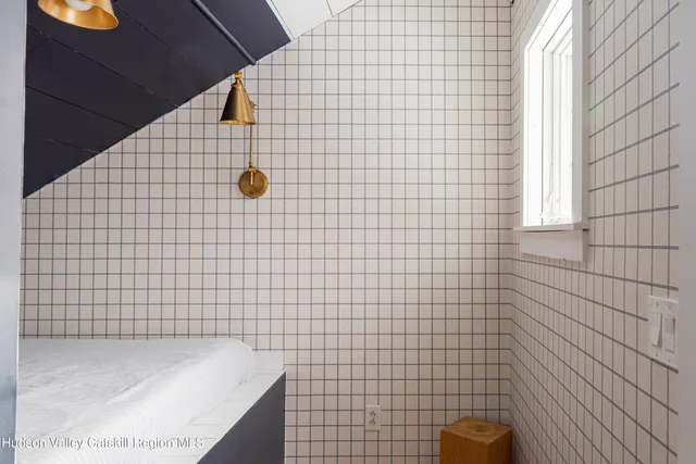 a view of a balcony with wooden floor