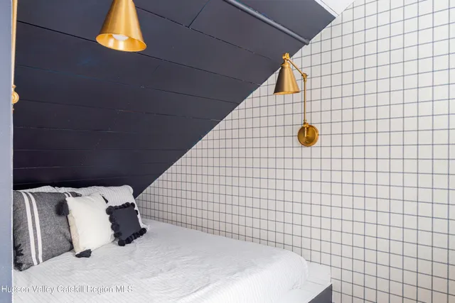 a view of a porch with a floor to ceiling window