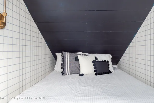 a view of a swimming pool with a yard