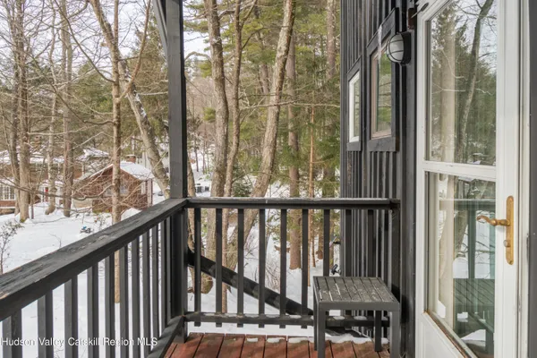 a view of a swimming pool with a patio and yard