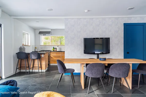 a view of a dining room with furniture