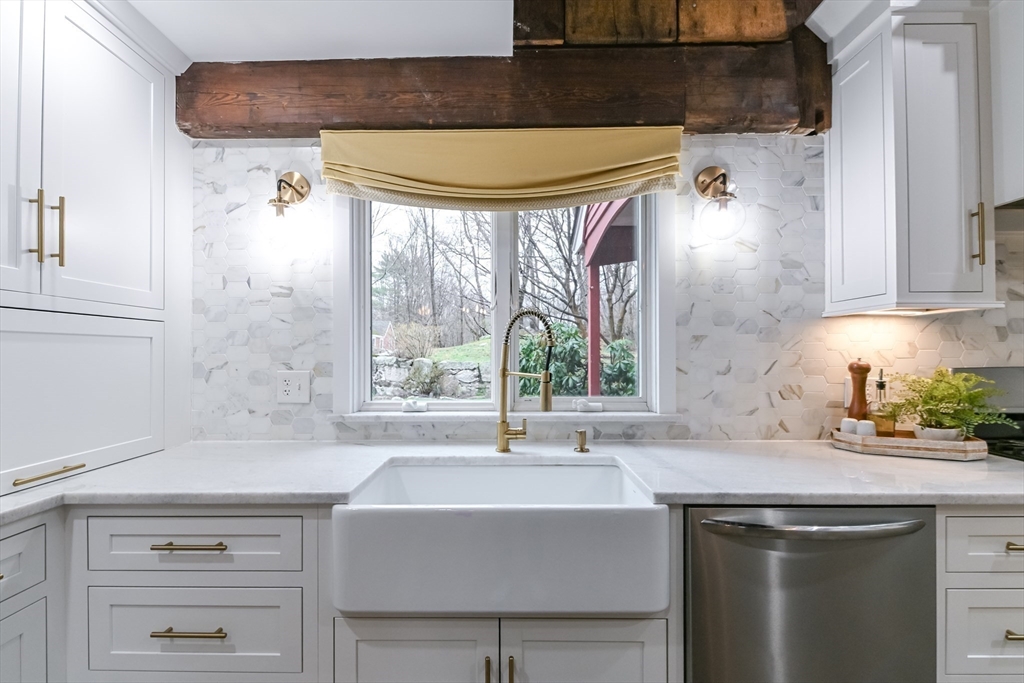 436 High Street Walpole, MA 02081 - Photo 11 of 42 a kitchen with a sink and a window