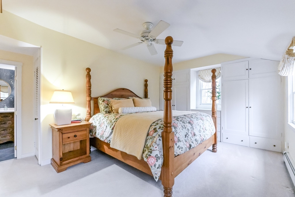 436 High Street Walpole, MA 02081 - Photo 16 of 42 a bedroom with a bed and a window
