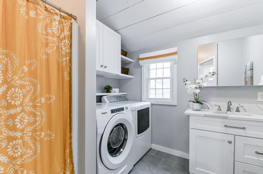 436 High Street Walpole, MA 02081 - Photo 21 of 42 a utility room with sink dryer and washer