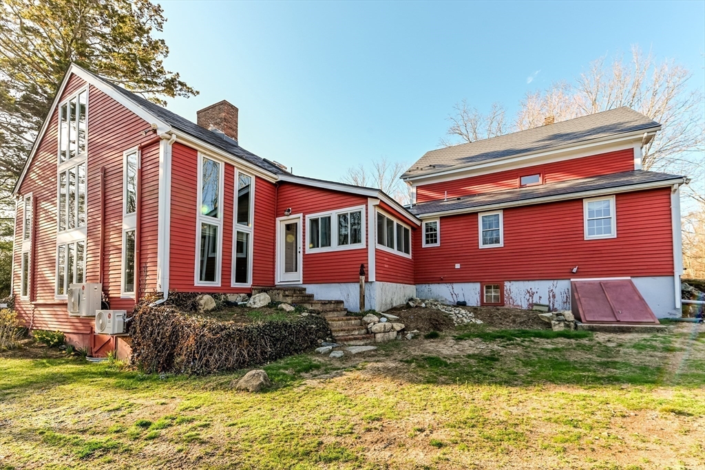 436 High Street Walpole, MA 02081 - Photo 36 of 42 a front view of a house with a yard