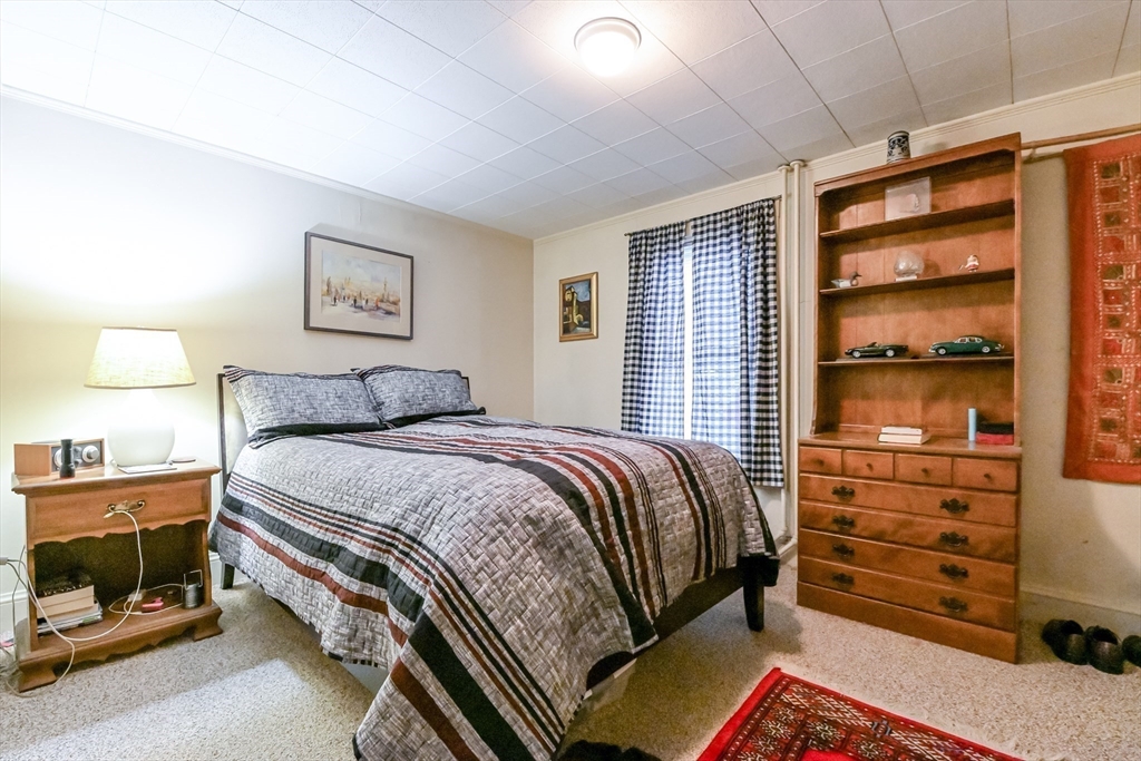 436 High Street Walpole, MA 02081 - Photo 38 of 42 a bedroom with a bed and a window