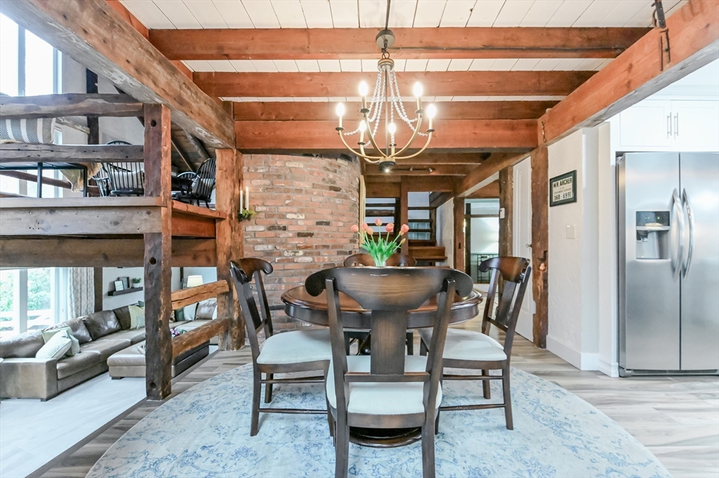 436 High Street Walpole, MA 02081 - Photo 8 of 42 a view of a dining room with furniture