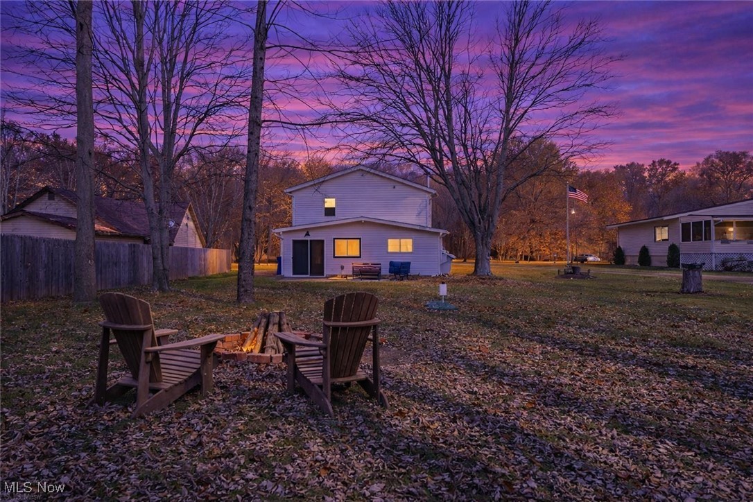 3793 Ranfield Road Kent, OH 44240 - Photo 32 of 40 View of yard with a fire pit