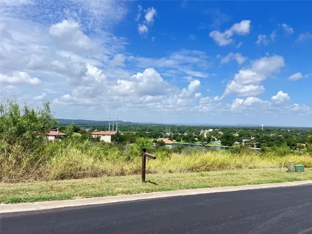 a view of a street from a balcony