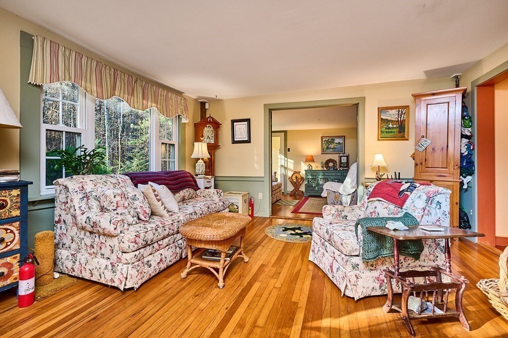 42 Cushman Road Leverett, MA 01054 - Photo 4 of 16 a living room with furniture and a flat screen tv