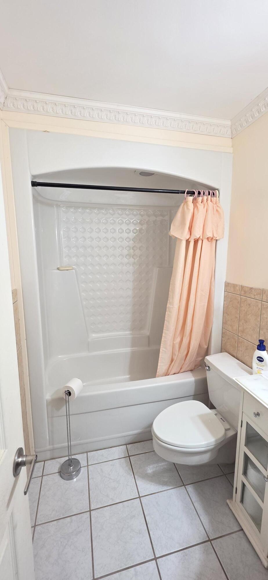 8 Emerald Drive Key West, FL 33040 - Photo 28 of 43 a bathroom with a toilet and a shower