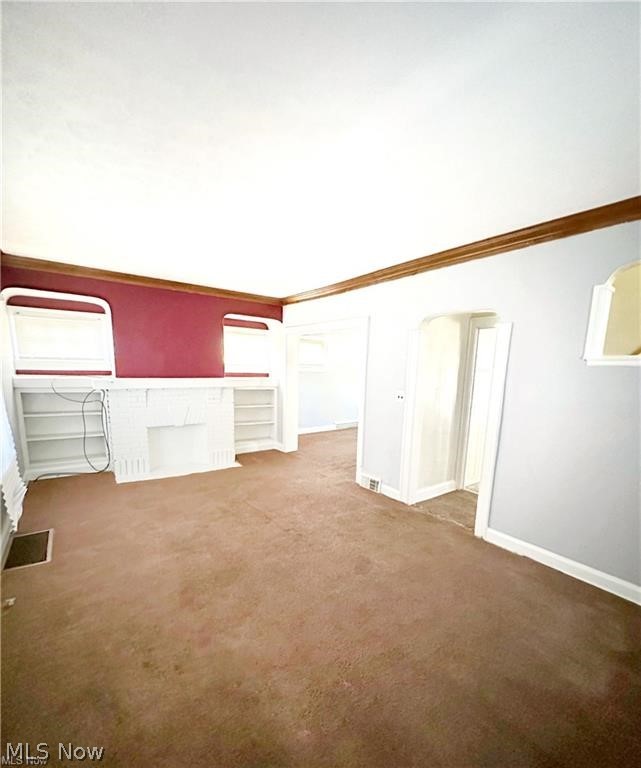 4643 Horton Road Cleveland, OH 44125 - Photo 21 of 21 Carpeted empty room with ornamental molding