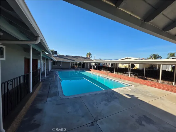 a house view with a swimming pool