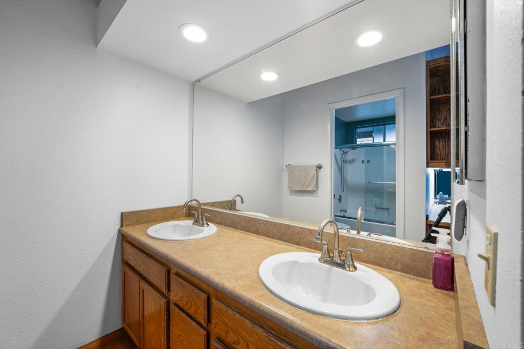 10254 Princess Joann Road Santee, CA 92071 - Photo 24 of 41 a bathroom with a sink and a mirror