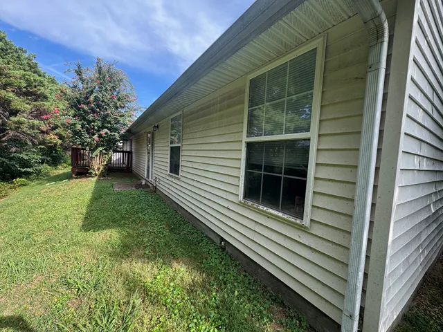 a view of a backyard with a garden
