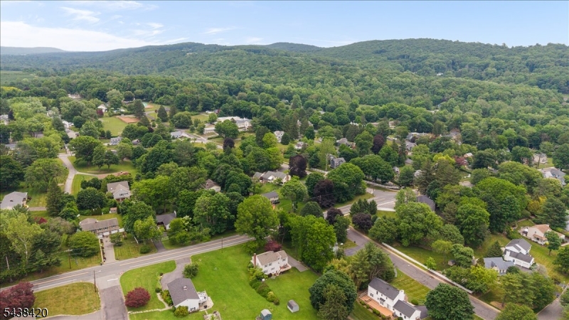 79 Main Street Califon, NJ 07830 - Photo 47 of 50 an aerial view of residential house with outdoor space and trees all around
