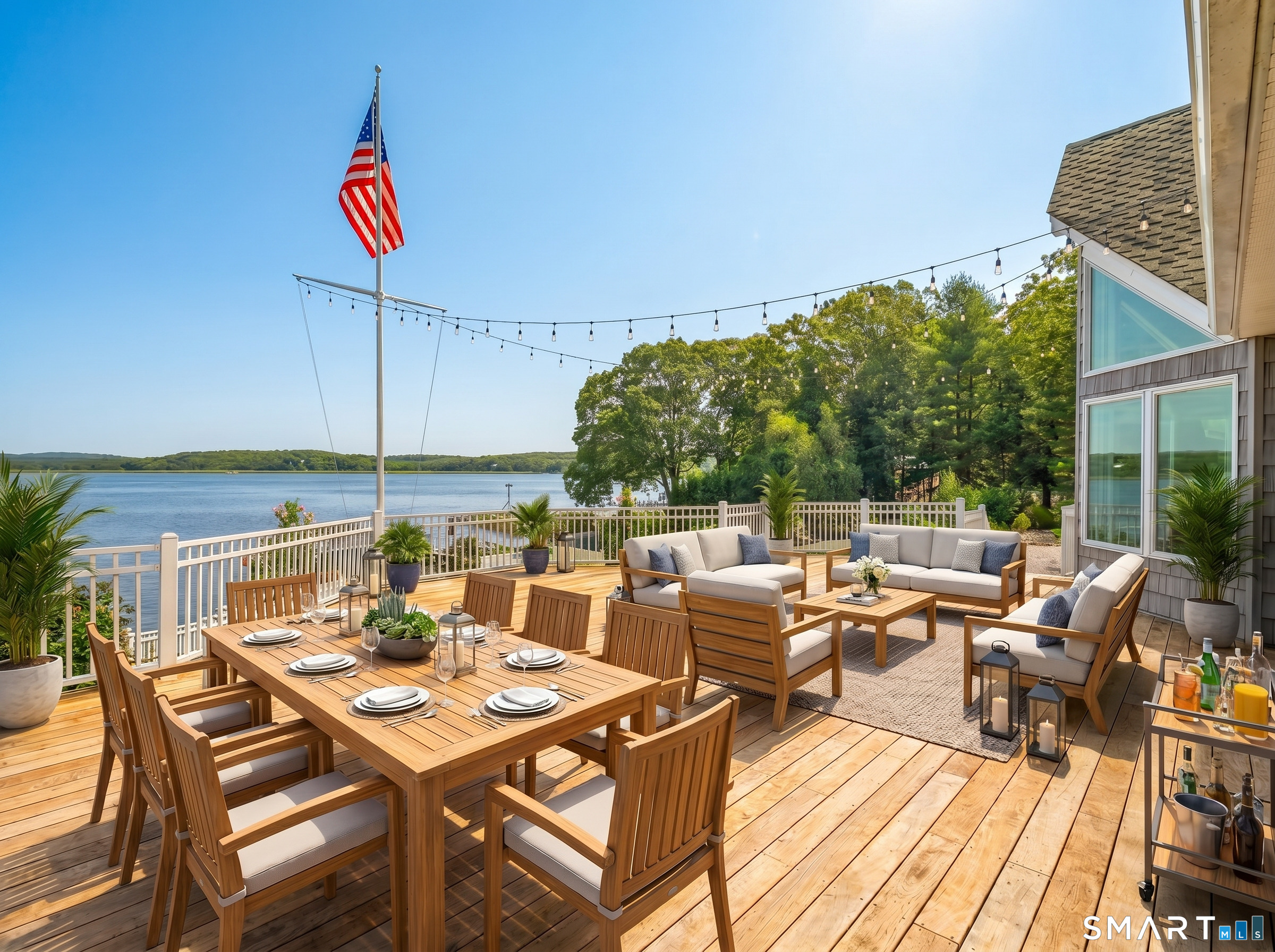12 Rocky Point Road Old Saybrook, CT 06475 - Photo 21 of 28 a view of a patio with a table and chairs
