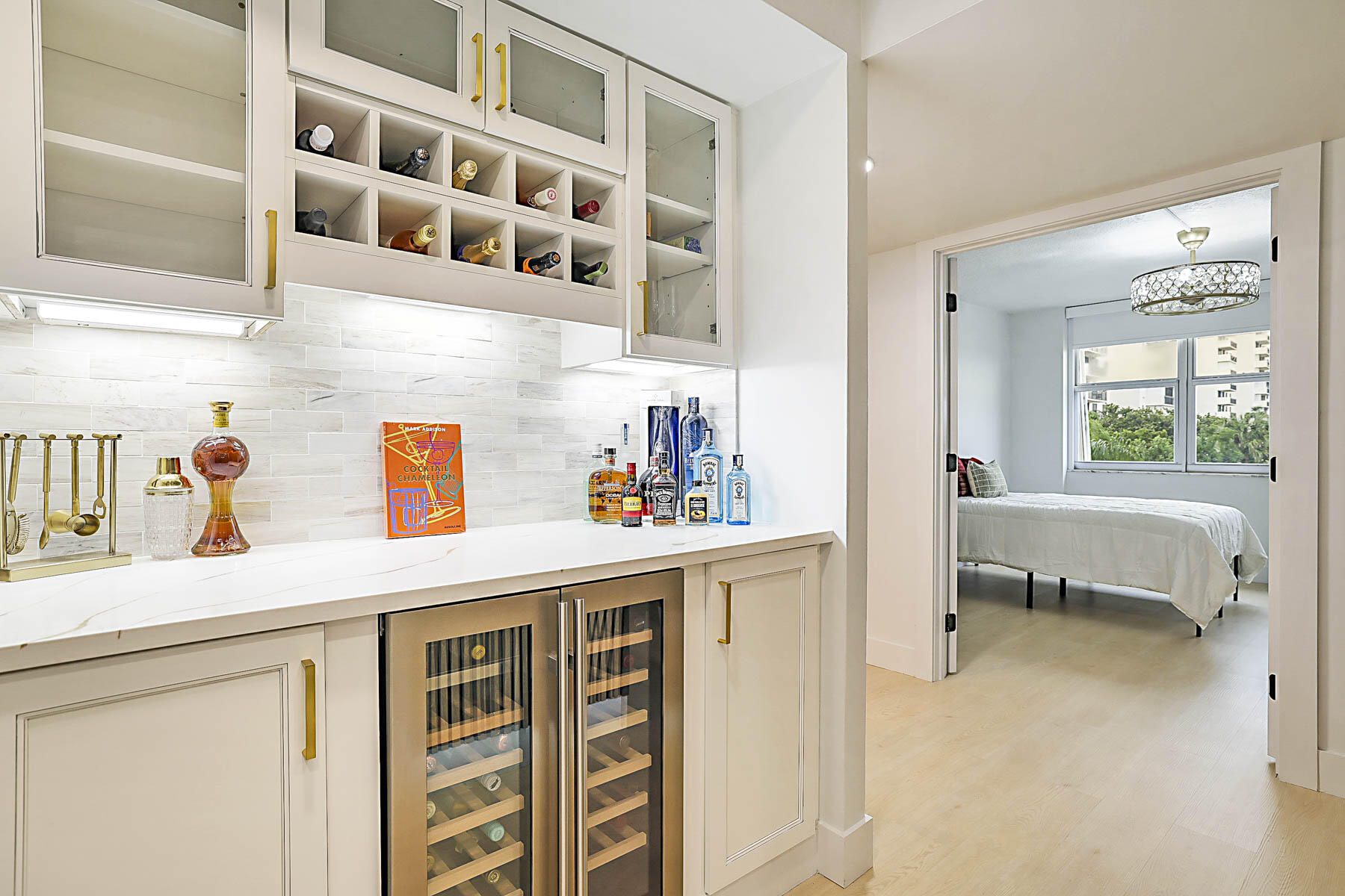 2121 North Ocean Boulevard, Unit 305W Boca Raton, FL 33431 - Photo 15 of 75 a kitchen with a sink and a window