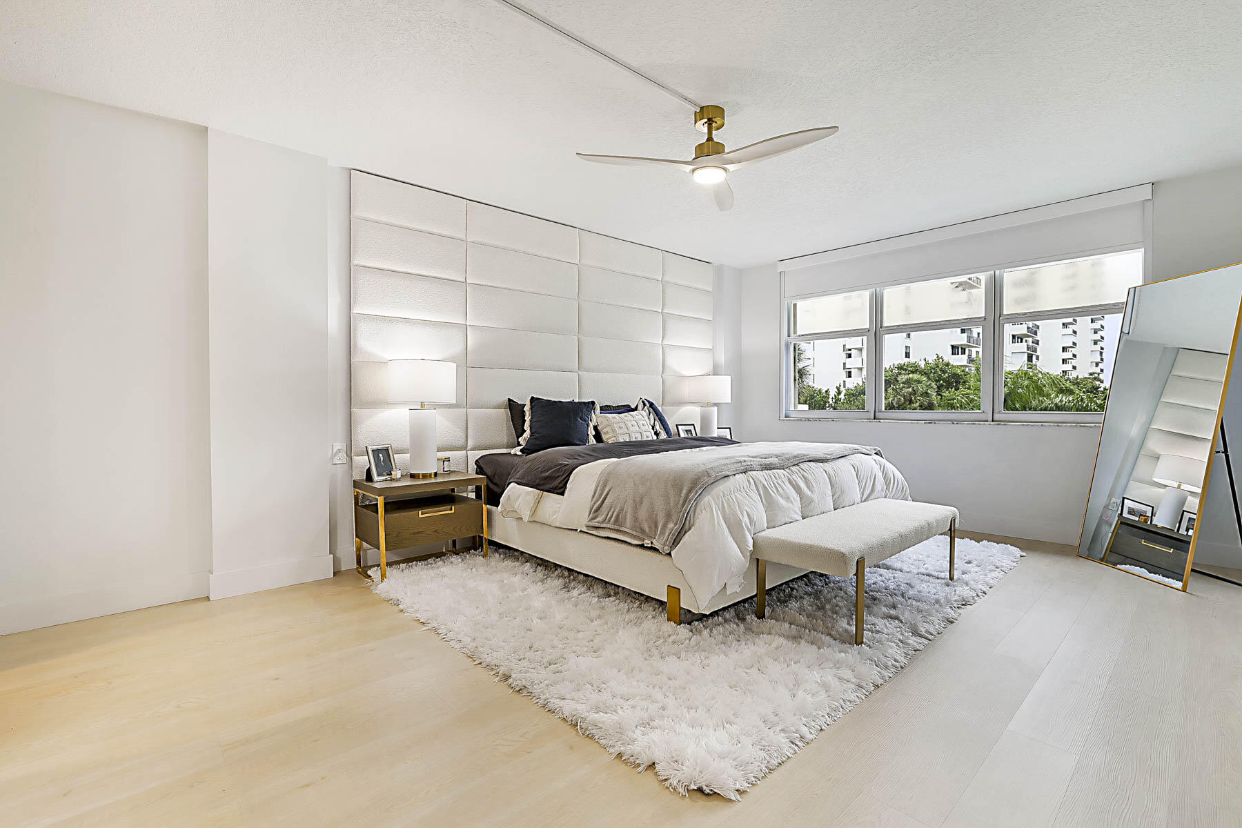 2121 North Ocean Boulevard, Unit 305W Boca Raton, FL 33431 - Photo 18 of 75 a bed room with a bed and a window