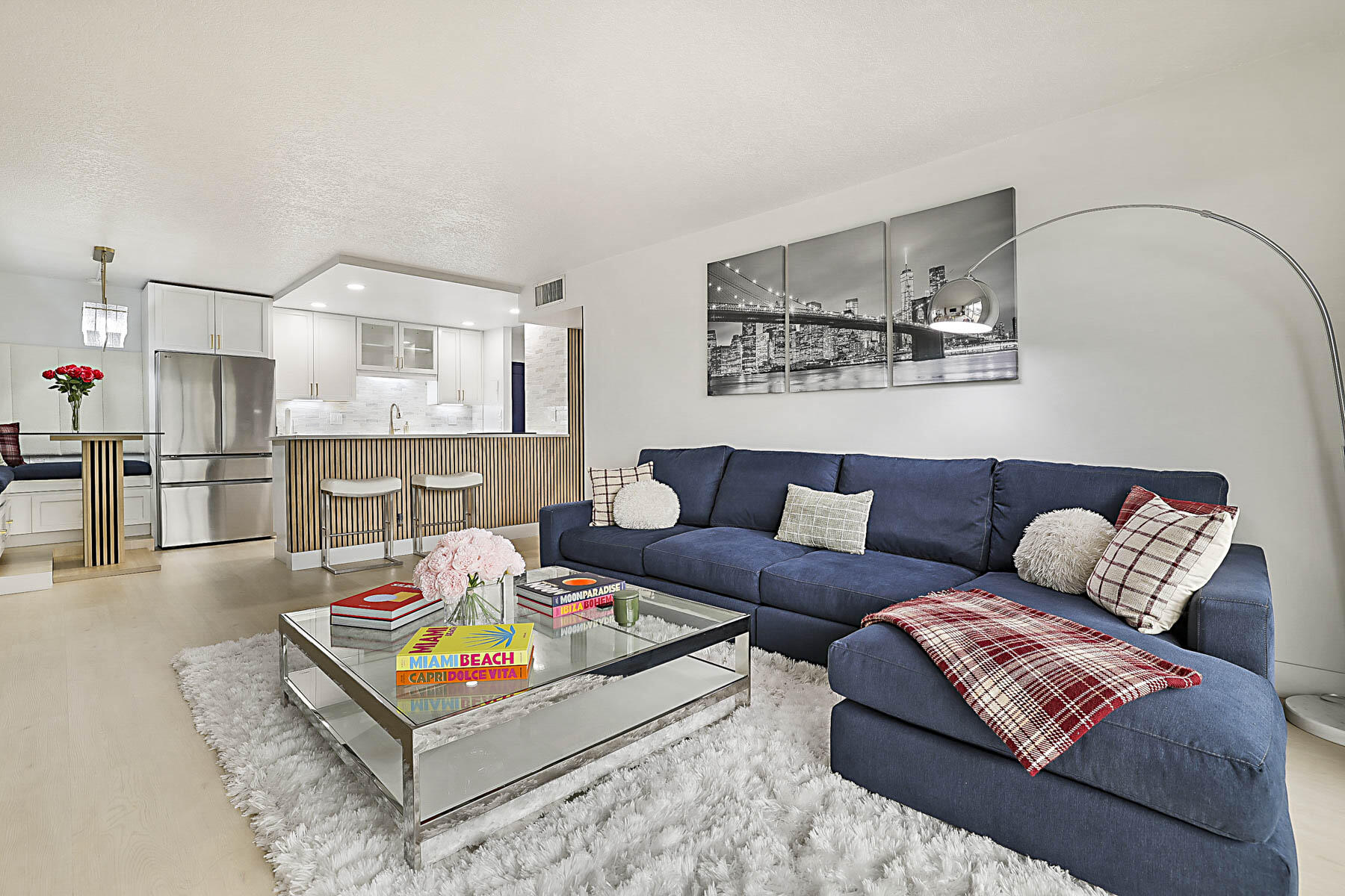 2121 North Ocean Boulevard, Unit 305W Boca Raton, FL 33431 - Photo 5 of 75 a living room with furniture and a table