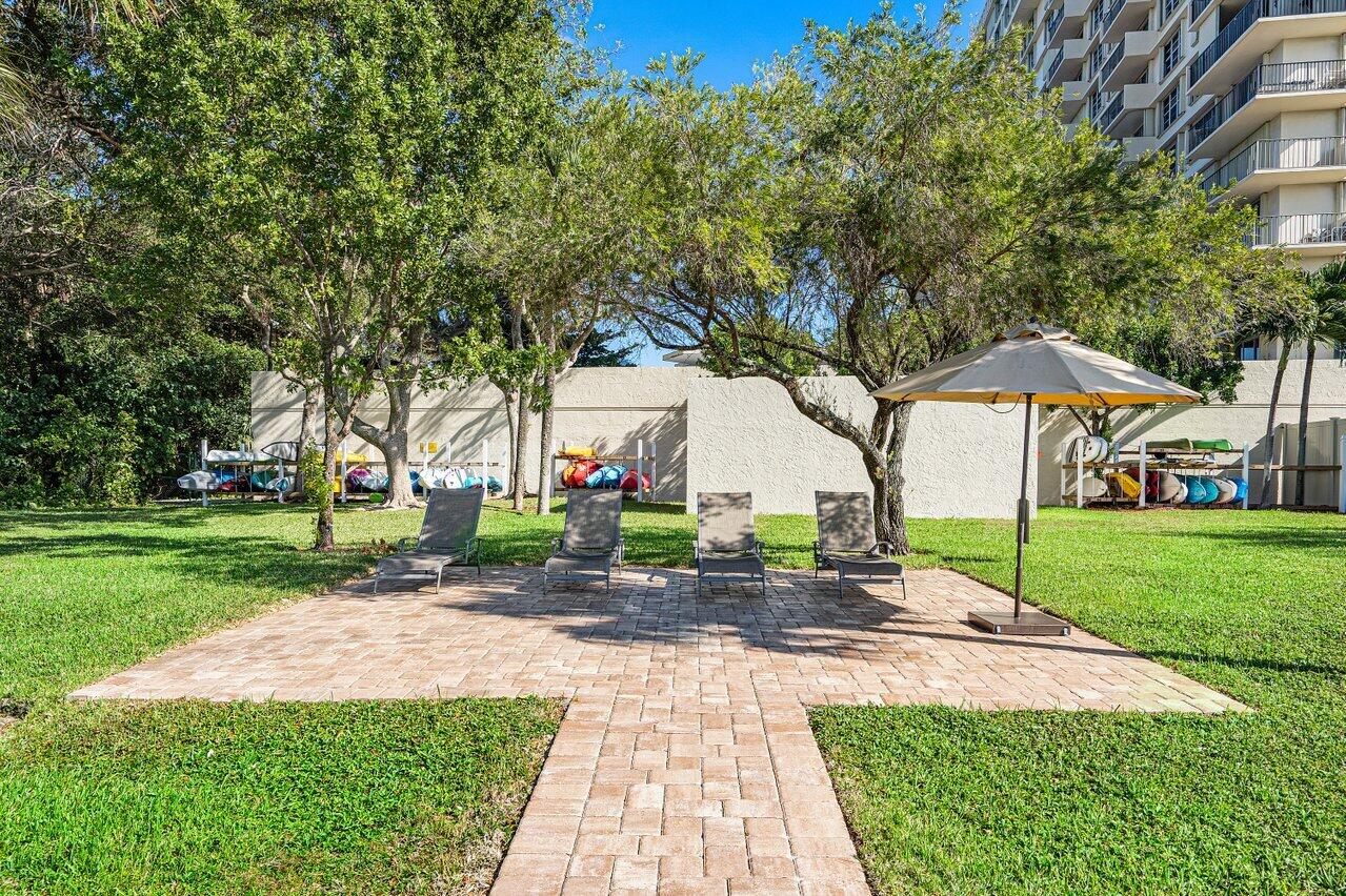 2121 North Ocean Boulevard, Unit 305W Boca Raton, FL 33431 - Photo 61 of 75 a view of a park with large trees