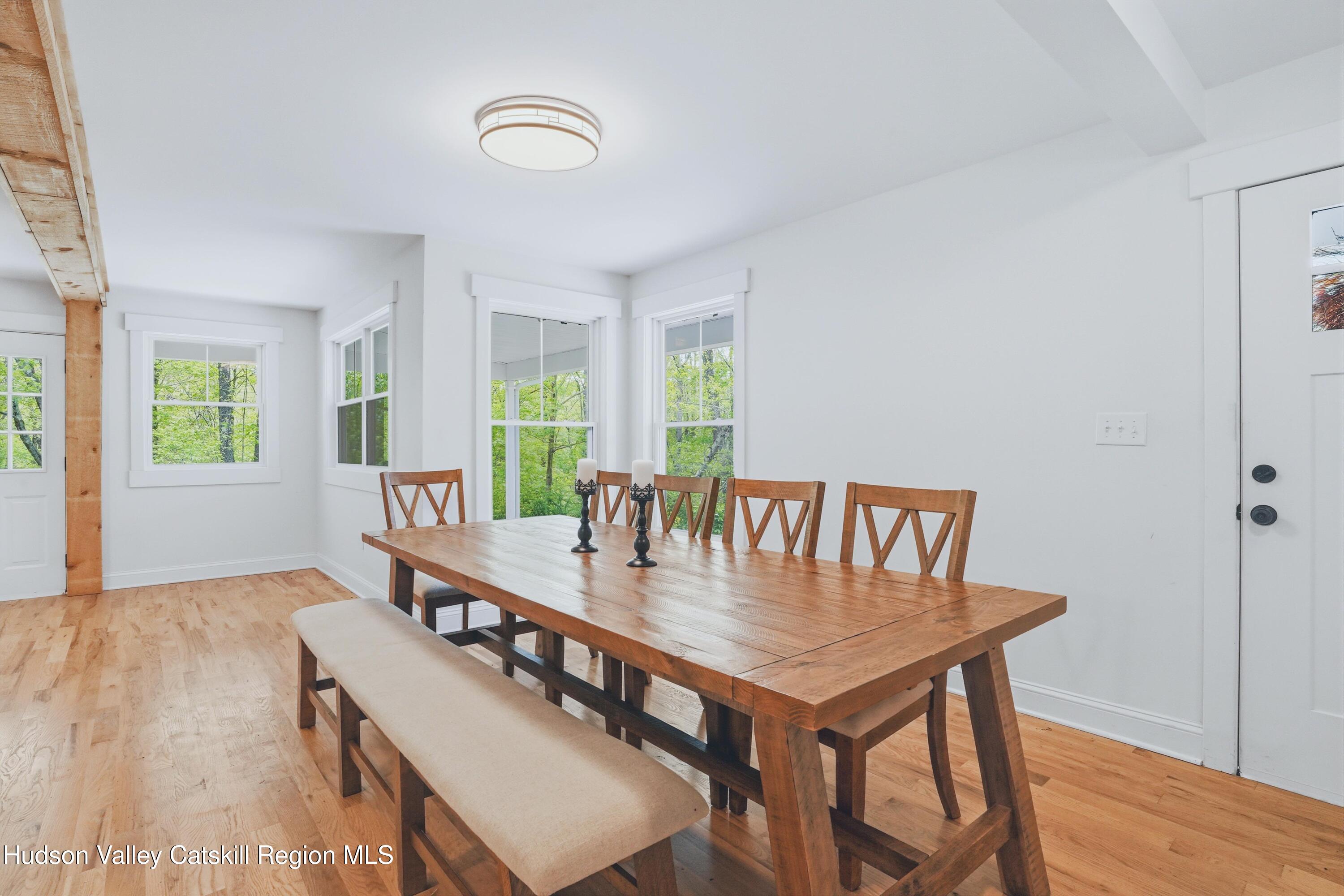 757 Taborton Road Sand Lake, NY 12153 - Photo 5 of 32 a view of a dining room with furniture and wooden floor