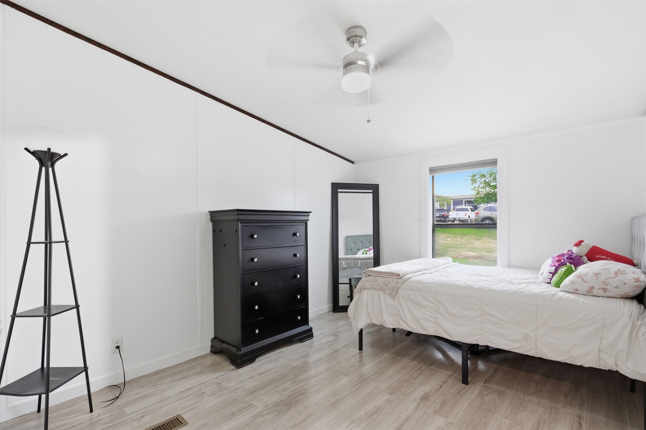 580 Railyard Drive Kyle, TX 78640 - Photo 16 of 20 The interior space features light-colored flooring, white walls, and a ceiling fan