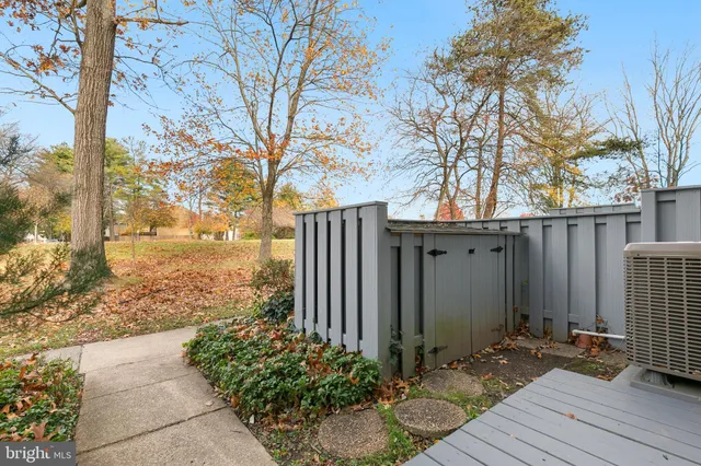 a view of a backyard of the house
