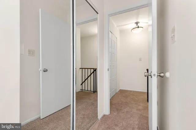 a spacious bedroom with a bed and a couch