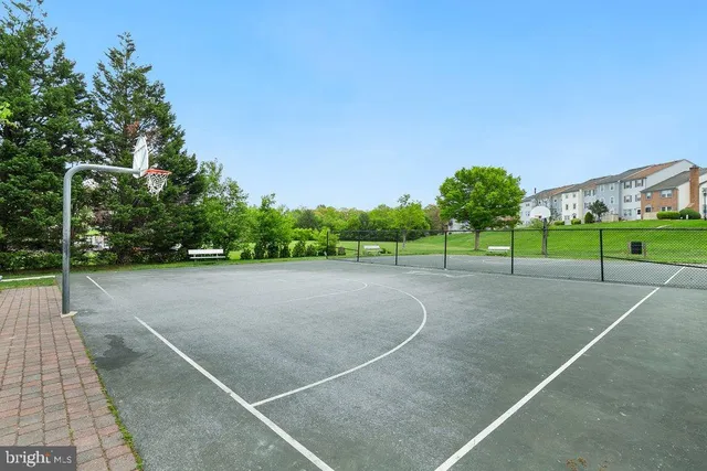 a sign on the side of the tree