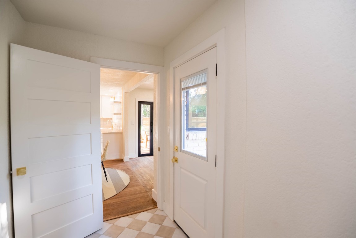 7700 Robalo Road Austin, TX 78757 - Photo 19 of 23 a bathroom with a vanity and a shower