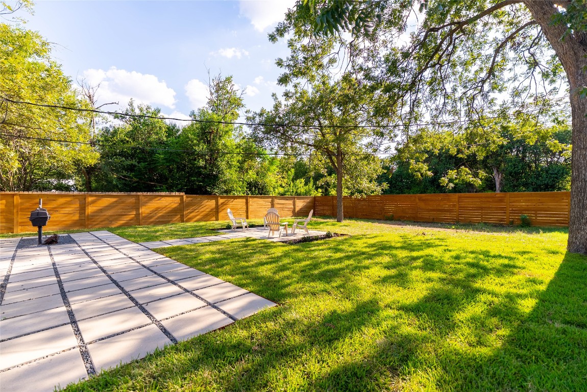 7700 Robalo Road Austin, TX 78757 - Photo 23 of 23 a view of yard with swimming pool and seating