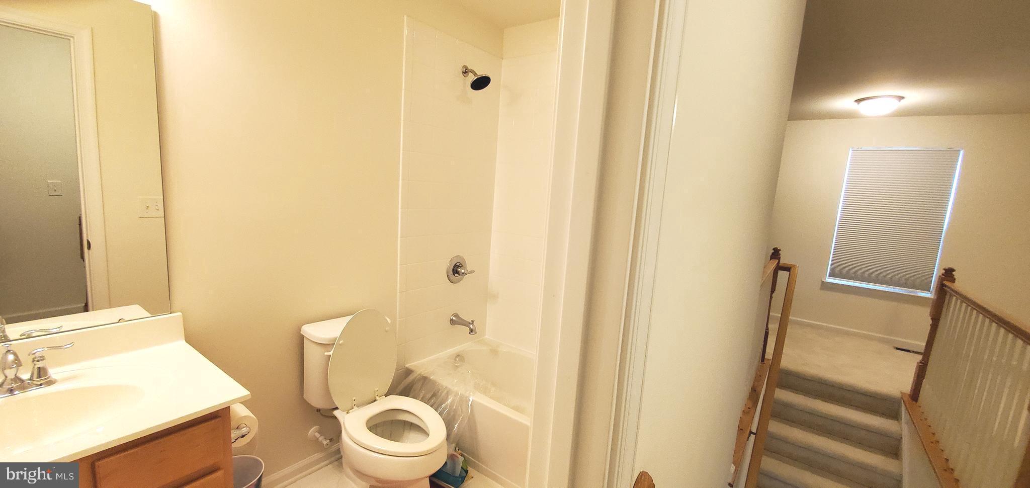 1999 Crossings Way Quakertown, PA 18951 - Photo 22 of 30 a white toilet sitting next to a bathroom sink