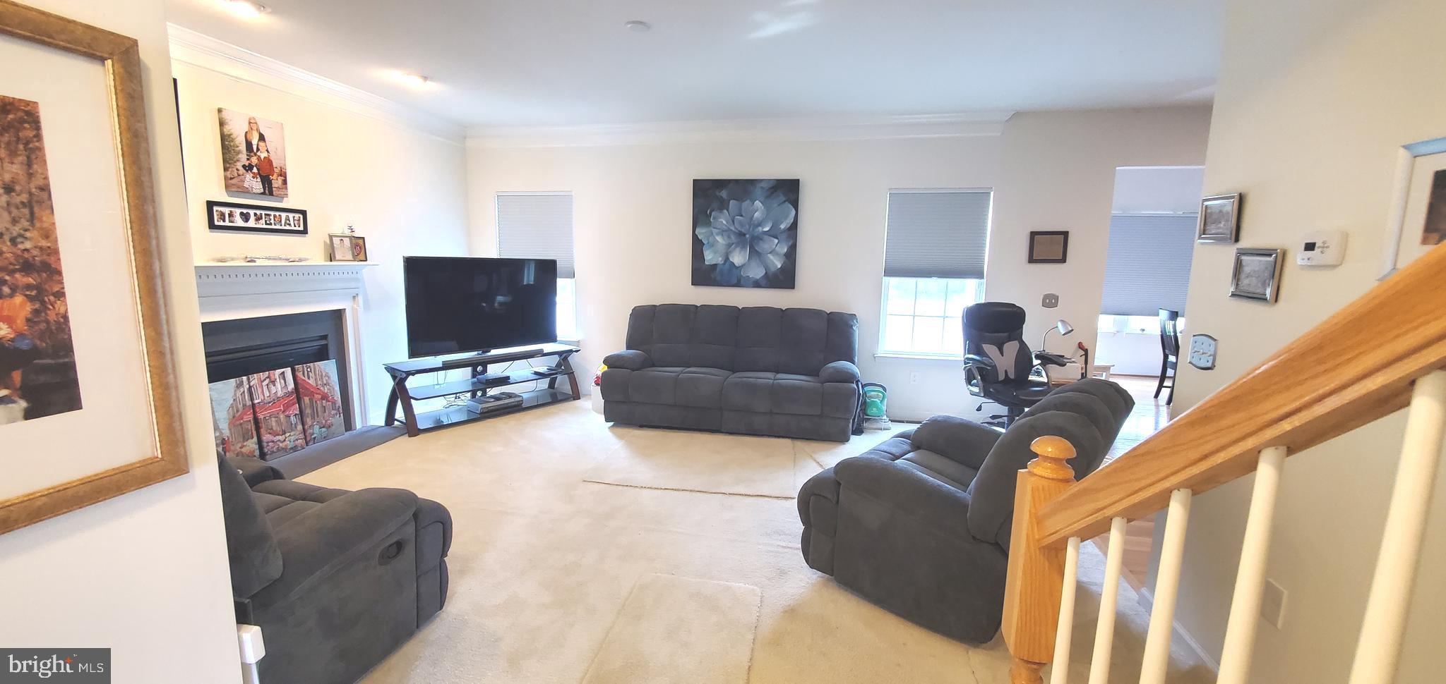 1999 Crossings Way Quakertown, PA 18951 - Photo 5 of 30 a living room with furniture and a flat screen tv