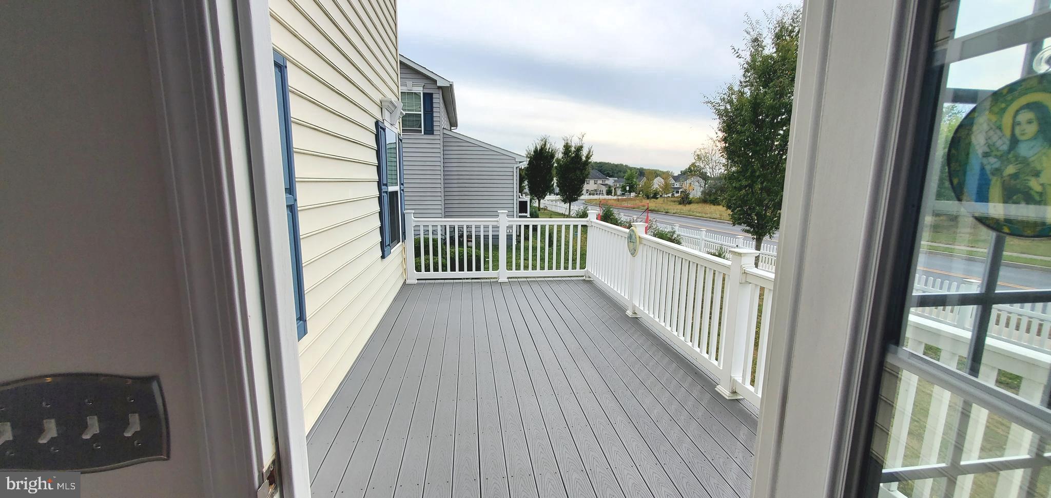 1999 Crossings Way Quakertown, PA 18951 - Photo 10 of 30 a view of balcony with wooden floor and fence