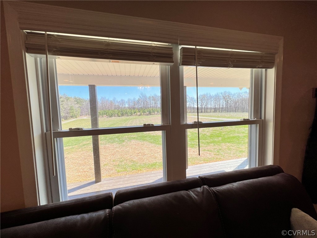 1214 Wilson Road Wilsons, VA 23894 - Photo 23 of 41 a living room with a large window