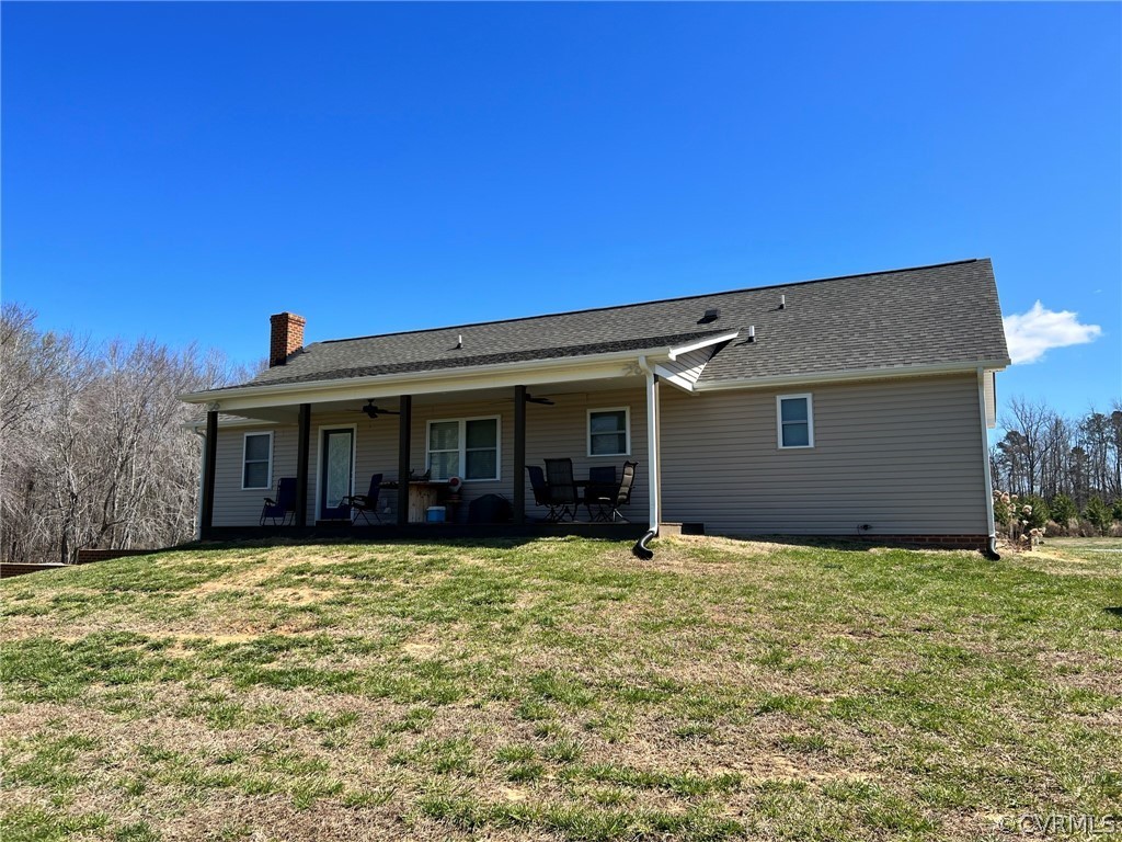 1214 Wilson Road Wilsons, VA 23894 - Photo 36 of 41 a view of a house with a yard