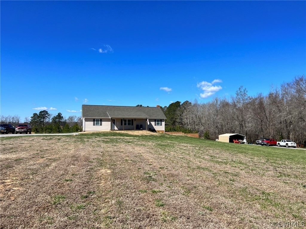 1214 Wilson Road Wilsons, VA 23894 - Photo 39 of 41 a view of a house with a yard