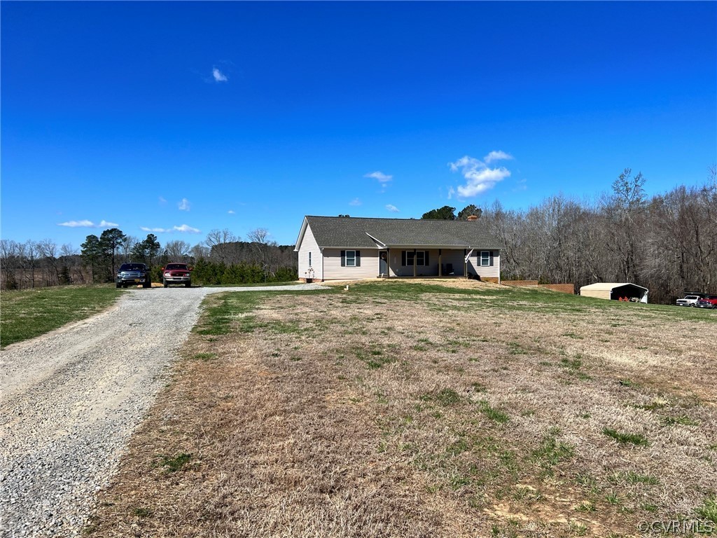 1214 Wilson Road Wilsons, VA 23894 - Photo 40 of 41 a view of a house with a yard
