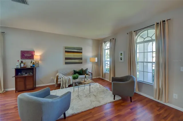 a view of a kitchen with granite countertop living room