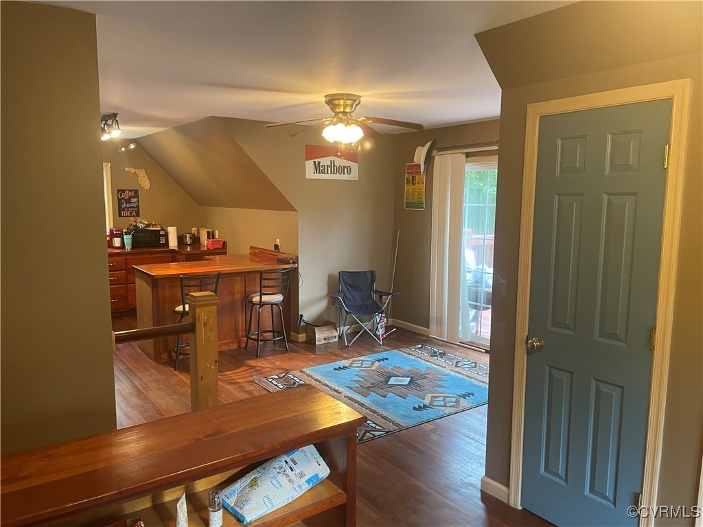1999 Manteo Road Buckingham, VA 23921 - Photo 8 of 24 a view of a workspace with furniture and wooden floor
