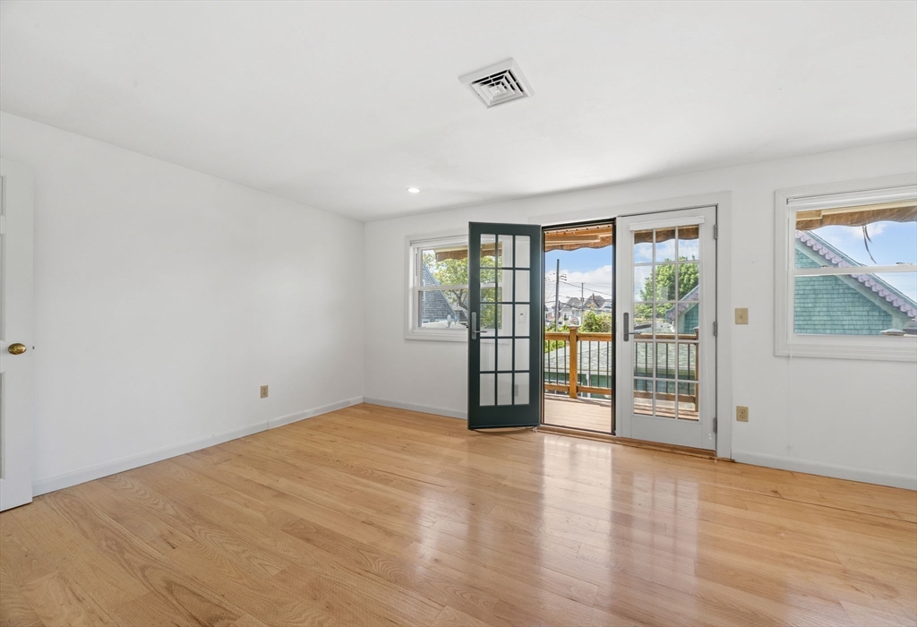 7 Grove Street Wareham, MA 02558 - Photo 21 of 41 wooden floor in an empty room with a window