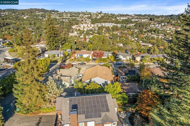 an aerial view of residential building with parking space