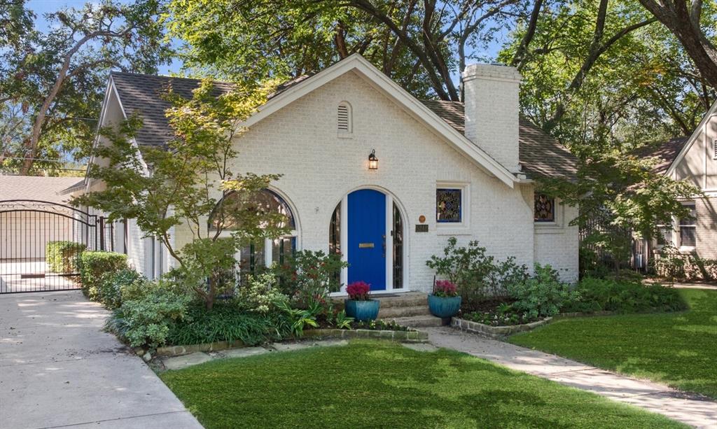 5242 Merrimac Avenue Dallas, TX 75206 - Photo 2 of 25 View of front of property with a gate, brick siding, a chimney, and a front lawn