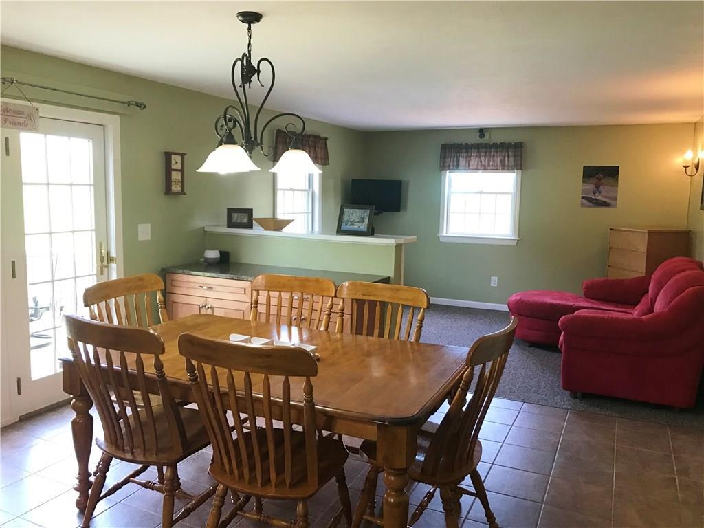 16 Bickford Road Dayton, ME 04005 - Photo 7 of 33 The tile floor flows into the dining...